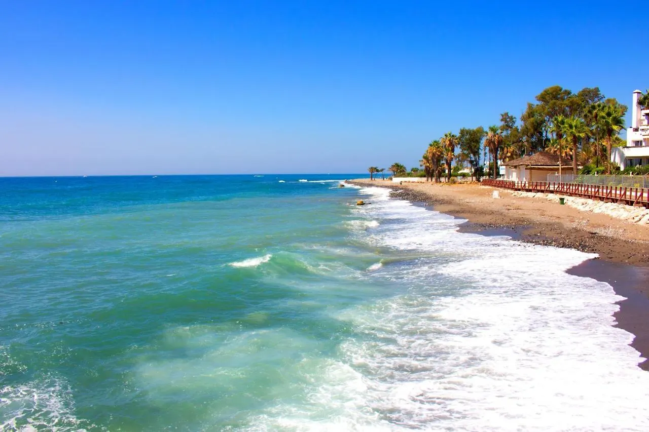 Romana Playa Beach Pool Paradise - Happy Rentals Marbella Spain